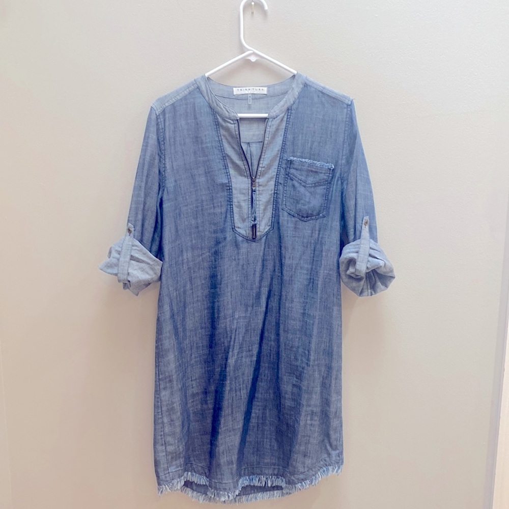 Trina Turk Denim dress with fringe bottom and roll-up sleeves. Size Medium